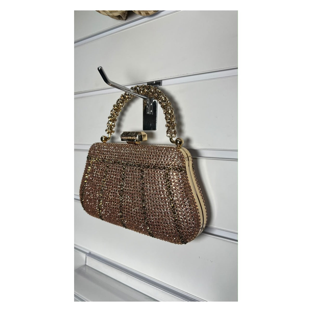 The Crystal Royale rhinestone evening clutch bag in champagne gold with gold-tone handle
