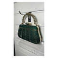 The Crystal Royale rhinestone evening clutch bag in emerald green with gold-tone handle